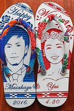 沖縄のリゾート婚に結婚式ウェルカムボード用似顔絵島ぞうりアート